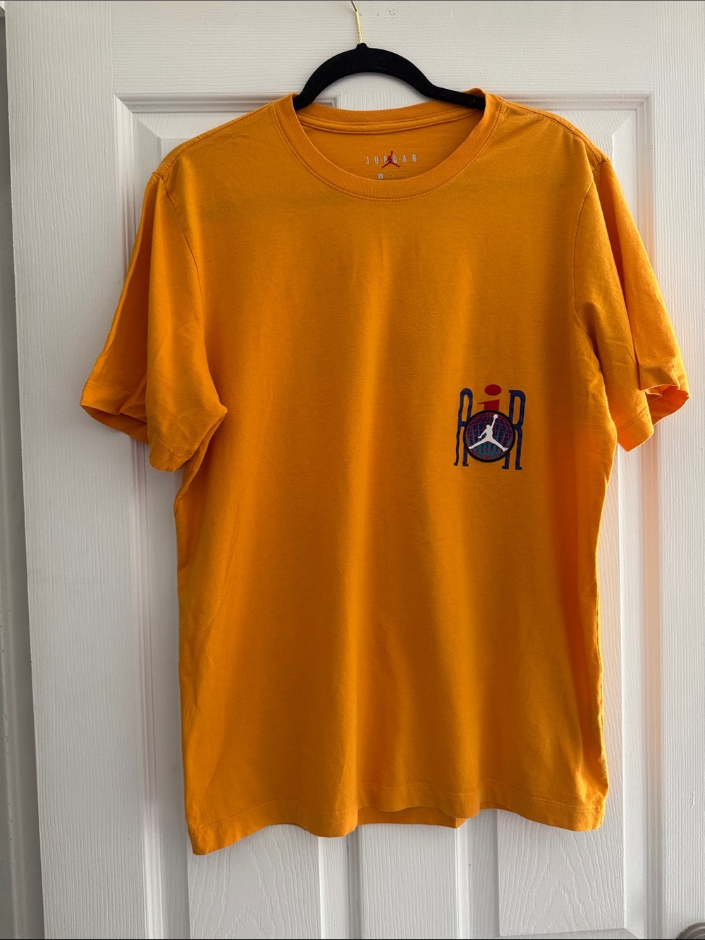 Jordan Men's Short-Sleeve Tee in Bright Orange with Pocket Logo